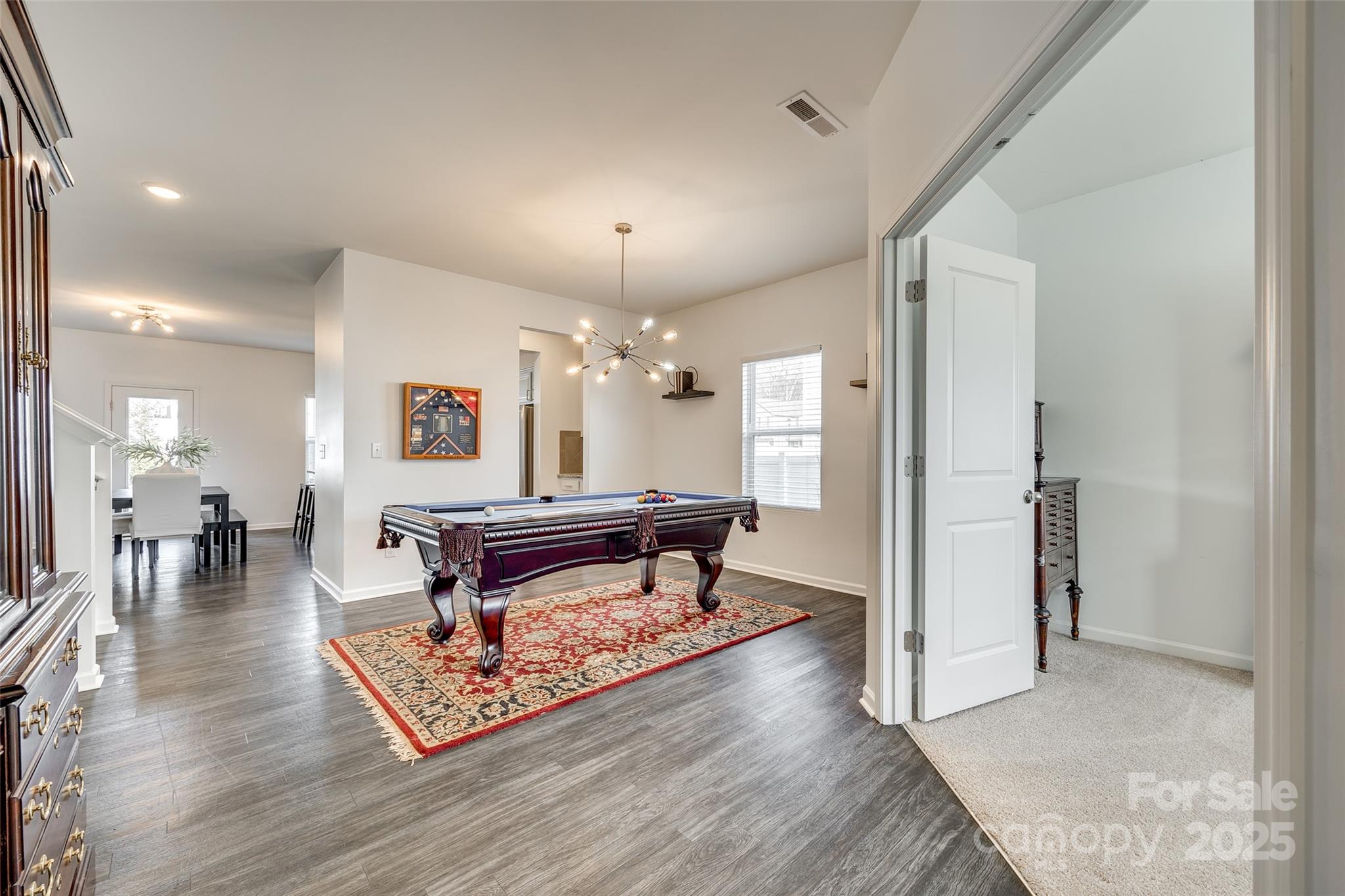634 Gants Road York, SC 29745 - Photo 6 of 42 a living room with furniture a table and wooden floor
