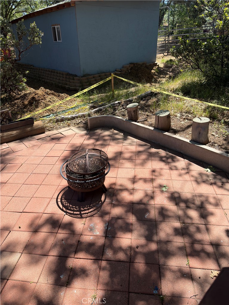 1610 North Grass Valley Road Lake Arrowhead, CA 92352 - Photo 15 of 28 a view of a backyard of a house
