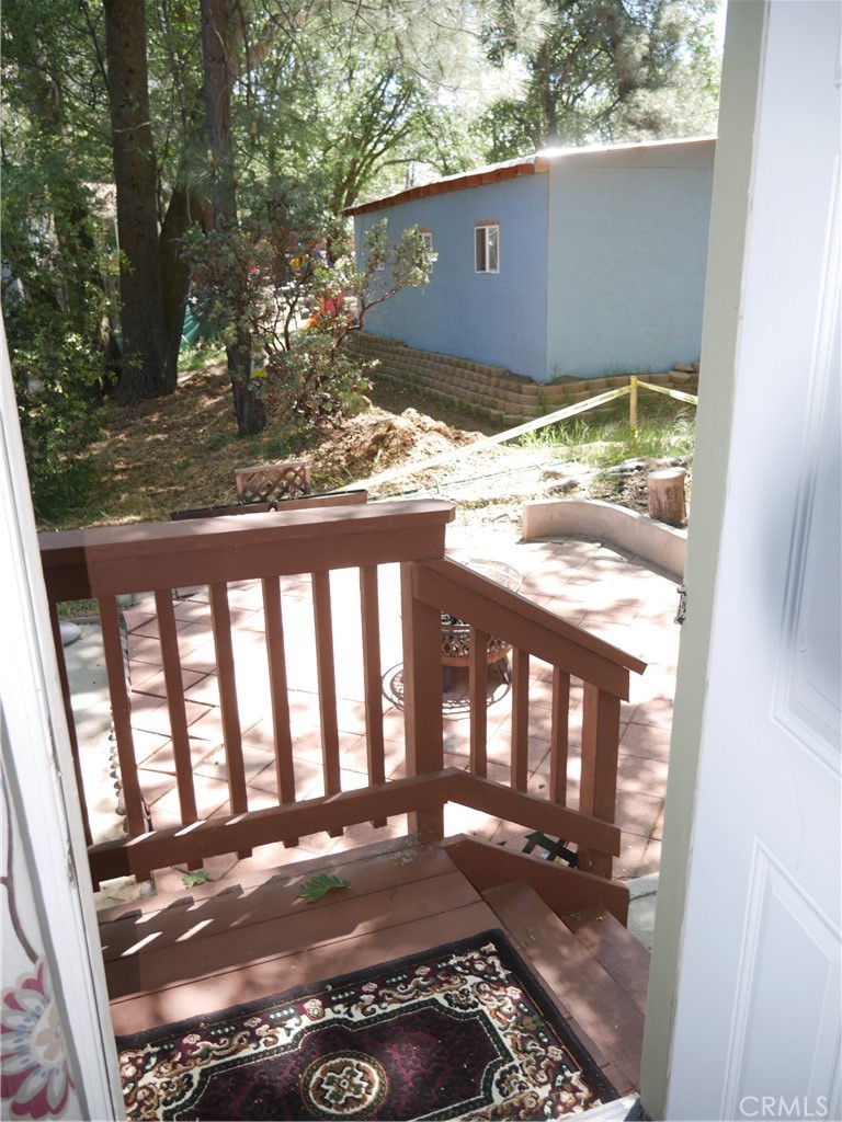 1610 North Grass Valley Road Lake Arrowhead, CA 92352 - Photo 16 of 28 a view of backyard from a window