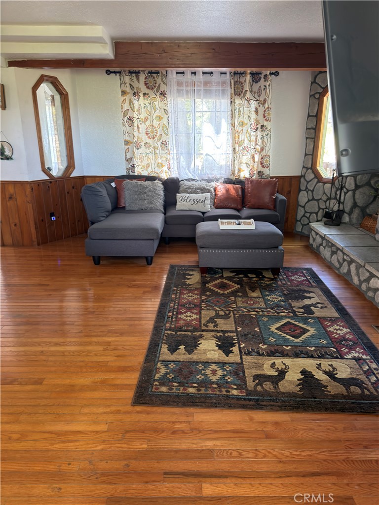 1610 North Grass Valley Road Lake Arrowhead, CA 92352 - Photo 6 of 28 a living room with furniture rug and window