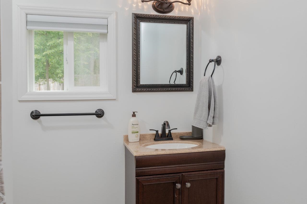159 Park View Shenandoah, VA 22849 - Photo 19 of 70 a bathroom with a sink a mirror and a window