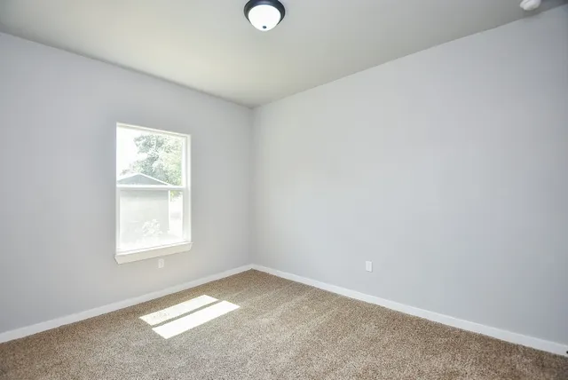 an empty room with a window