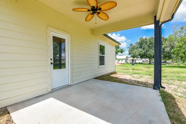 a view of a porch with a backyard
