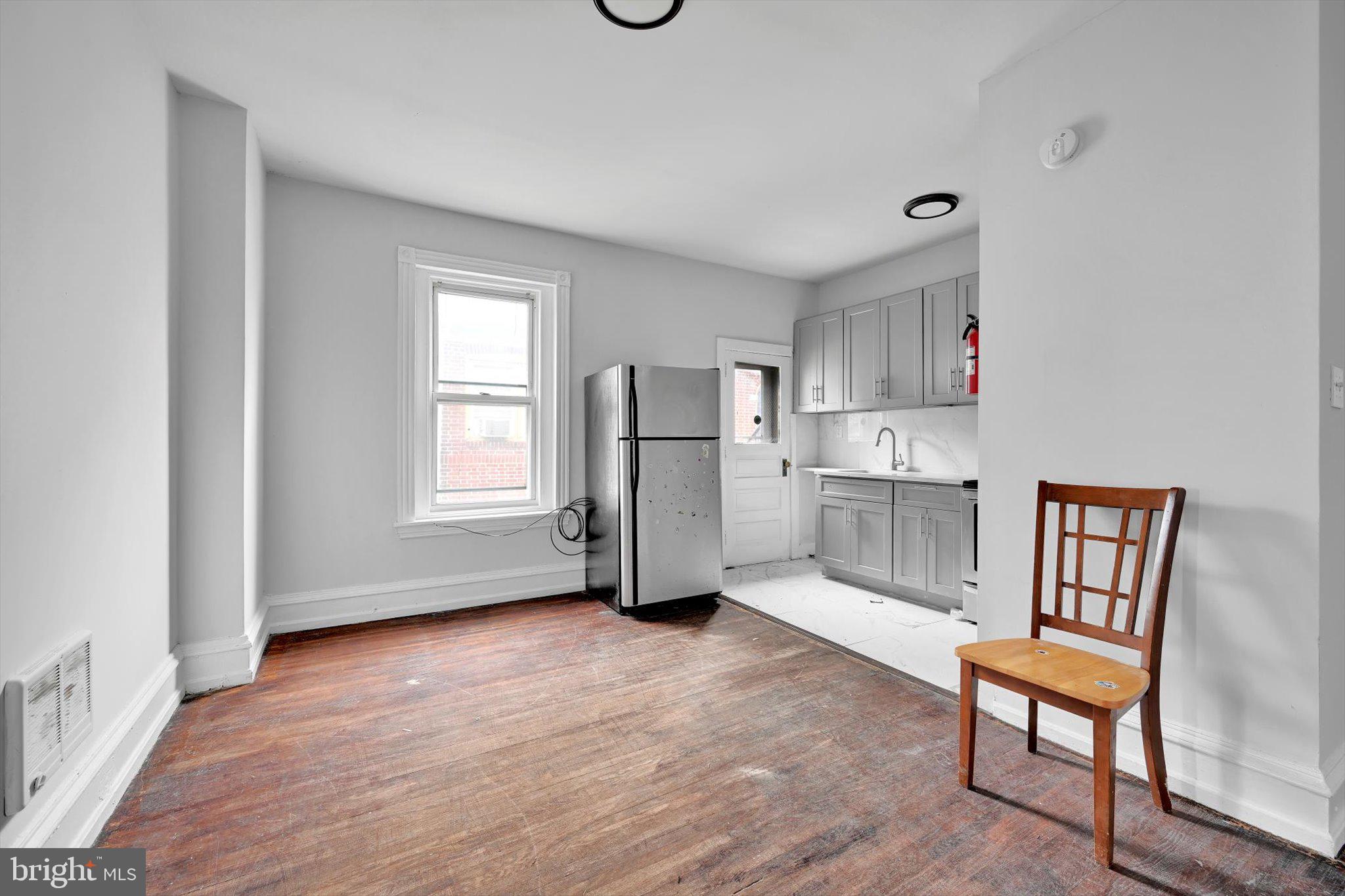 1330 Perkiomen Avenue Reading, PA 19602 - Photo 6 of 12 a view of kitchen with furniture and wooden floor