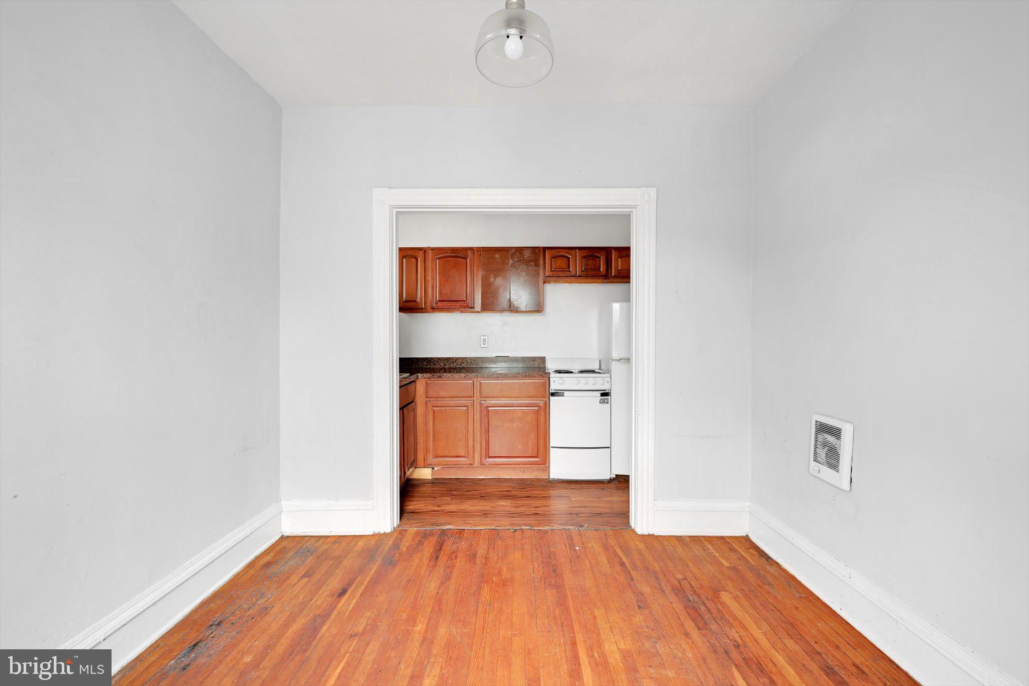 1330 Perkiomen Avenue Reading, PA 19602 - Photo 10 of 12 a view of a room with wooden floor and a sink