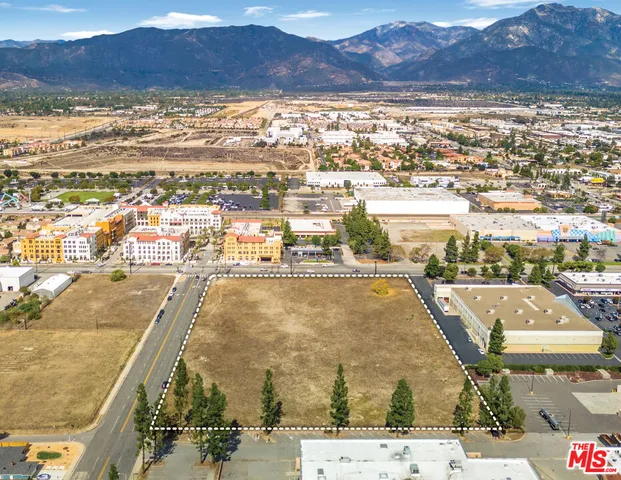 a view of a city with an ocean