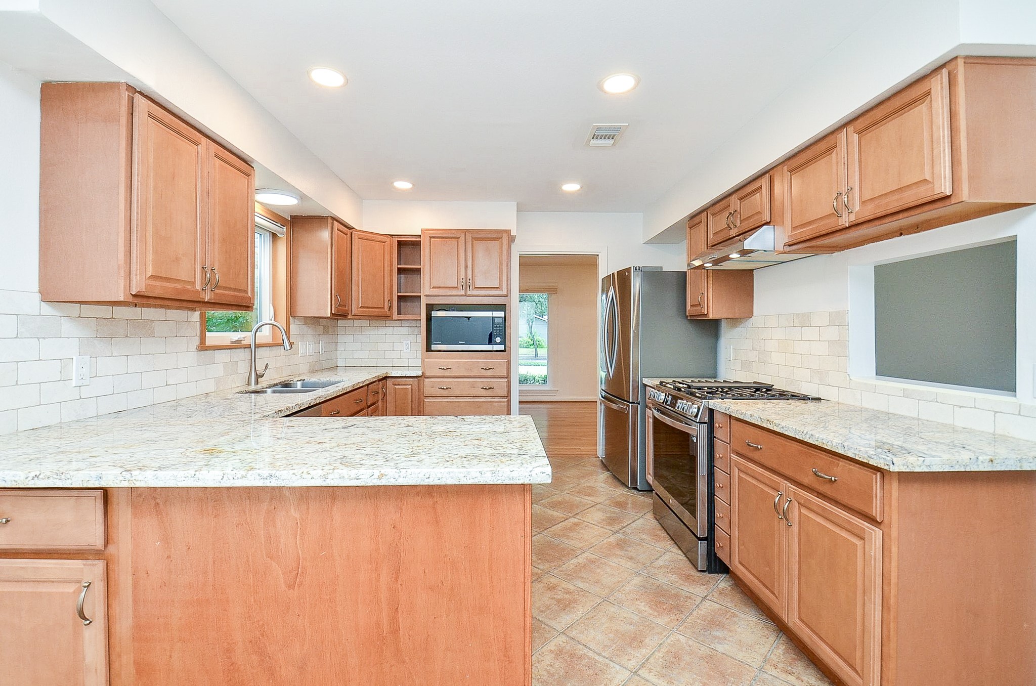 5127 Hummingbird Street Houston, TX 77035 - Photo 12 of 34 The kitchen has plenty of storage.