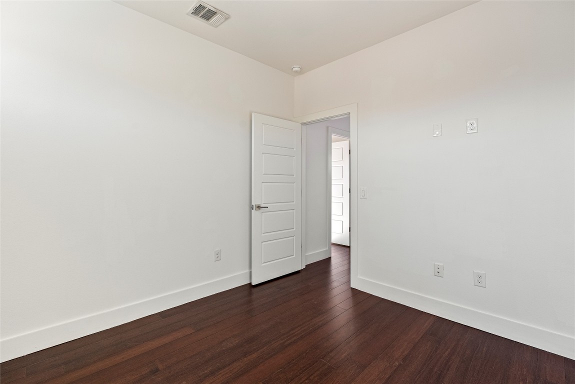 2201 Pennsylvania Avenue, Unit B Austin, TX 78702 - Photo 11 of 14 a view of an empty room with wooden floor