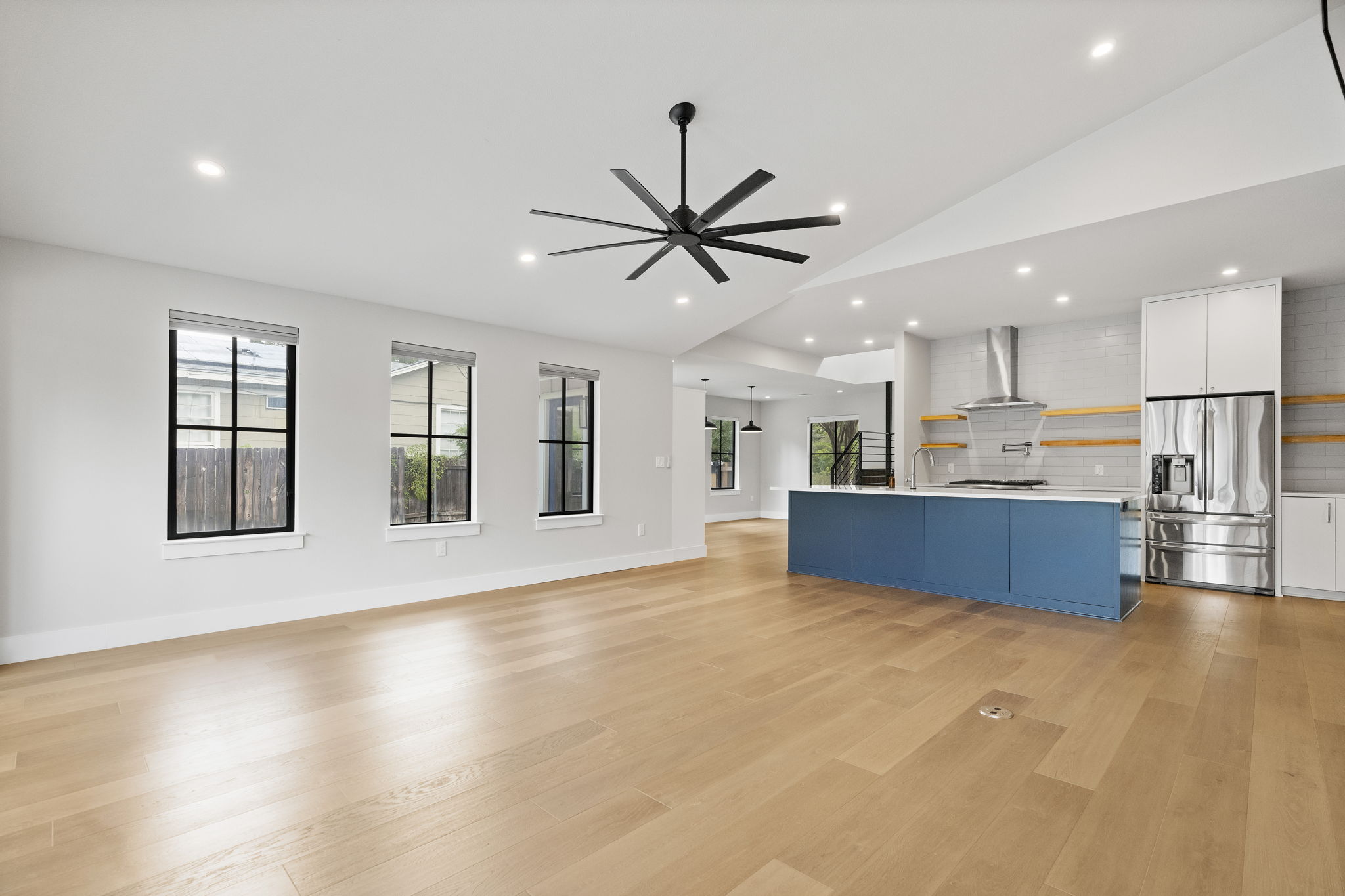 5604 Bull Creek Road Austin, TX 78756 - Photo 15 of 39 Open concept kitchen, living and dining areas create a beautiful flow perfect for entertaining.