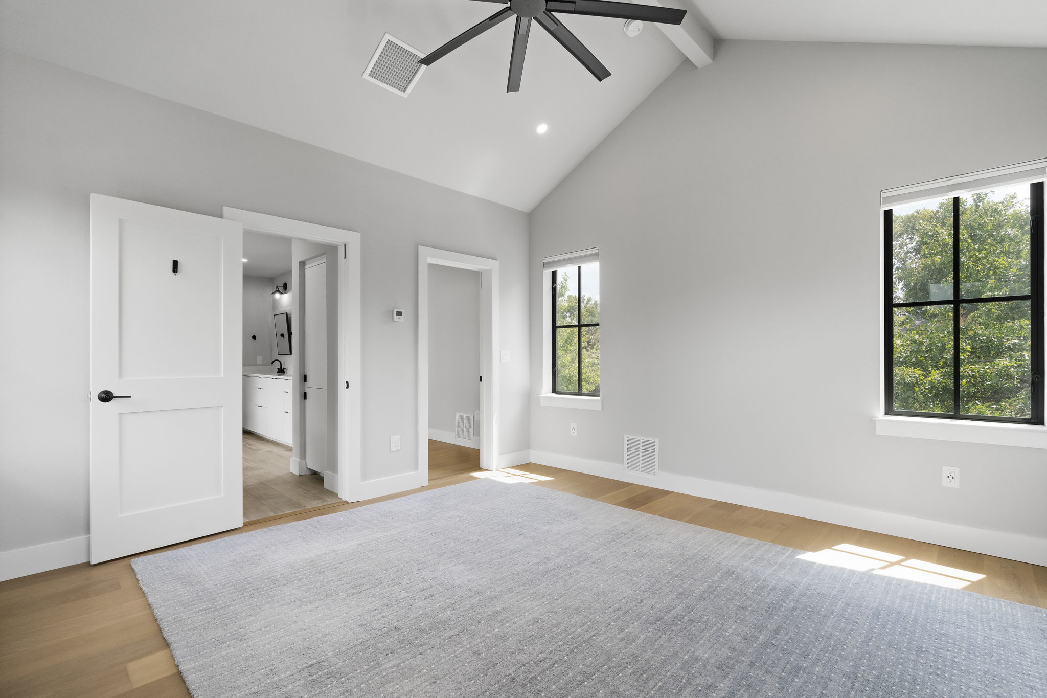 5604 Bull Creek Road Austin, TX 78756 - Photo 18 of 39 High ceilings and gorgeous natural lighting in the primary suite