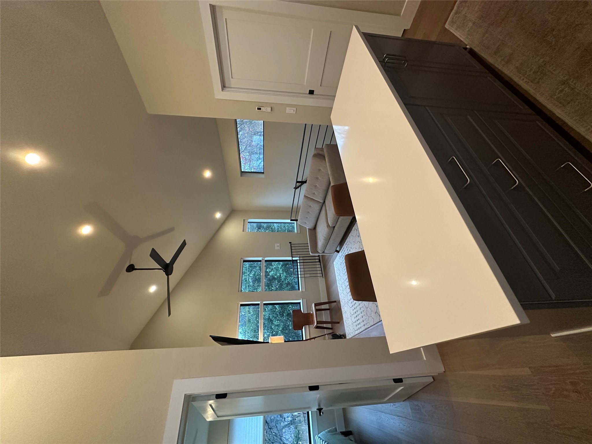 5604 Bull Creek Road Austin, TX 78756 - Photo 39 of 39 Kitchen with open floor plan, a kitchen island, ceiling fan, and plenty of natural light