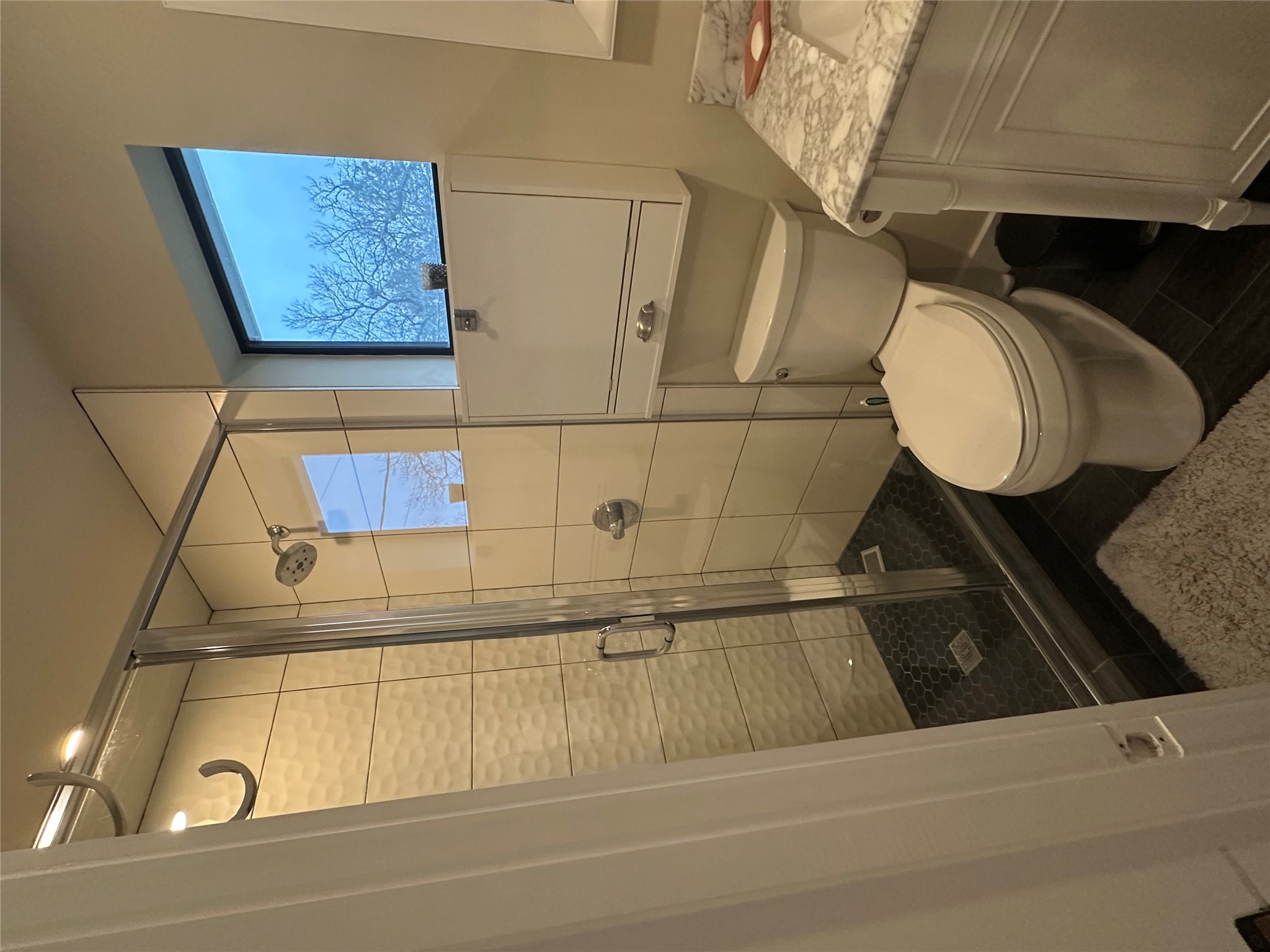 5604 Bull Creek Road Austin, TX 78756 - Photo 36 of 39 Full bath featuring a walk-in shower and vanity.