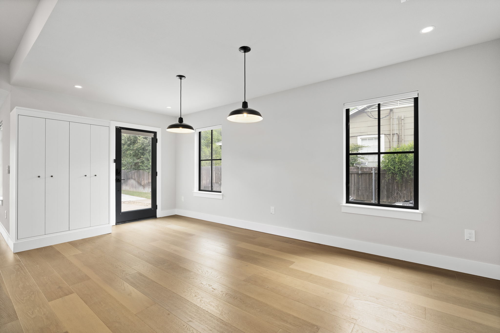 5604 Bull Creek Road Austin, TX 78756 - Photo 9 of 39 A door off the dining space provides access from the detached garage, perfect for bringing in groceries!