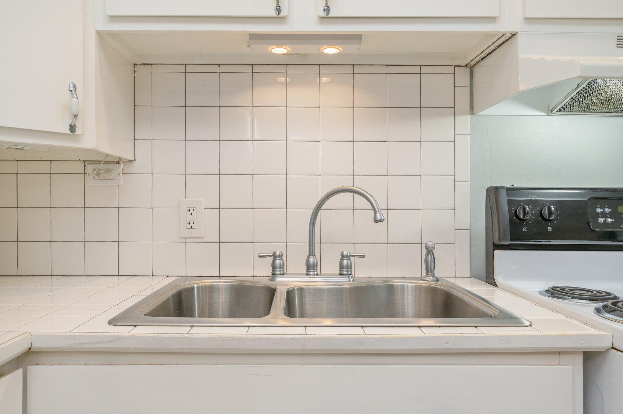 133 Smith Street Crestview, FL 32539 - Photo 11 of 28 a close view of sink and tap