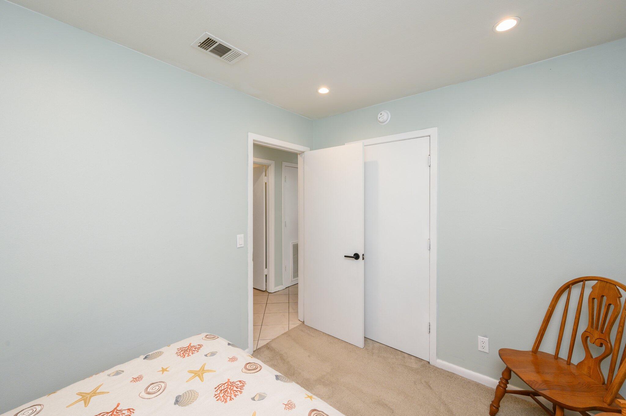 133 Smith Street Crestview, FL 32539 - Photo 16 of 28 a bathroom with a sink and a mirror