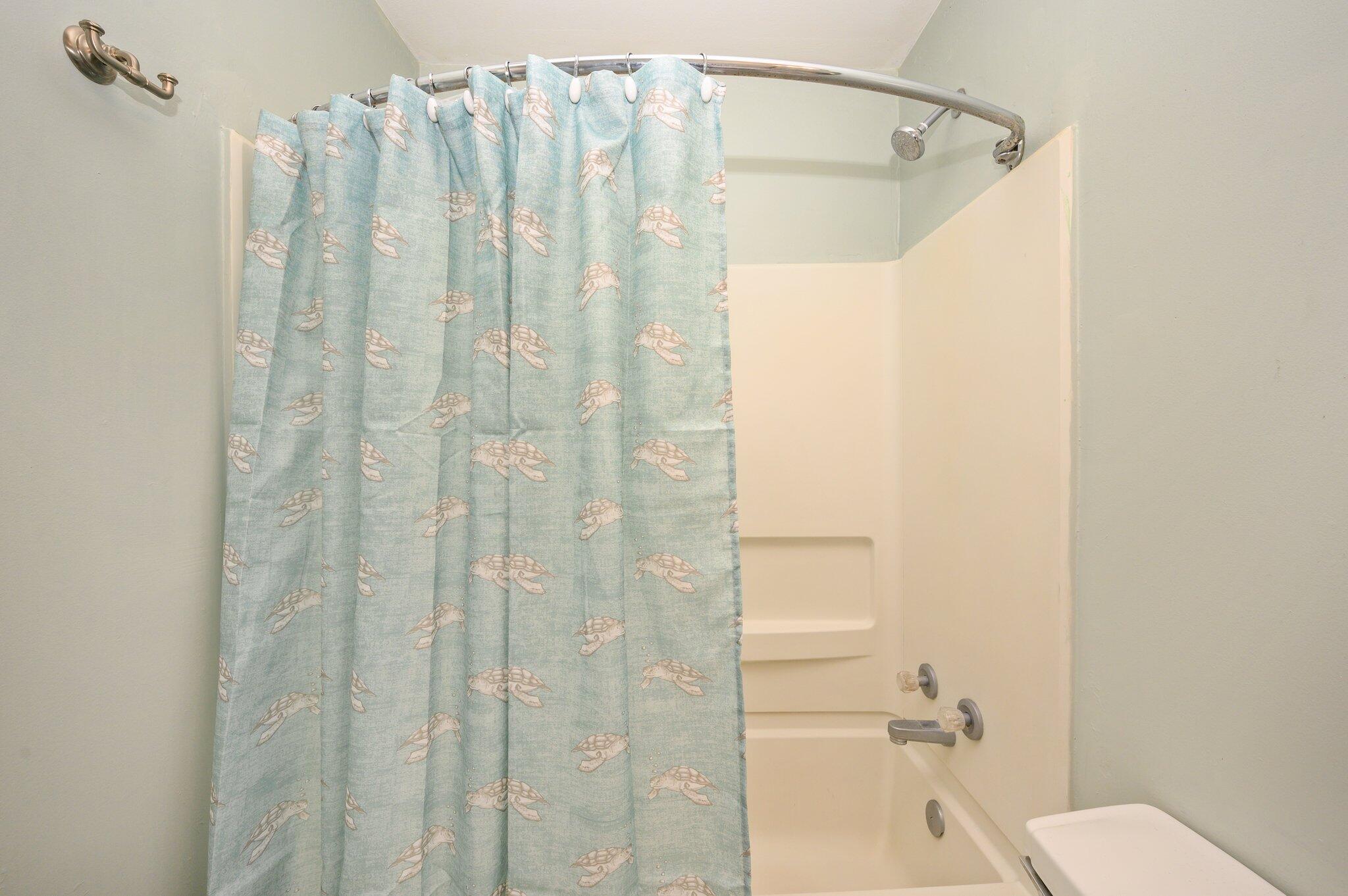 133 Smith Street Crestview, FL 32539 - Photo 22 of 28 a bathroom with a shower curtain and a toilet