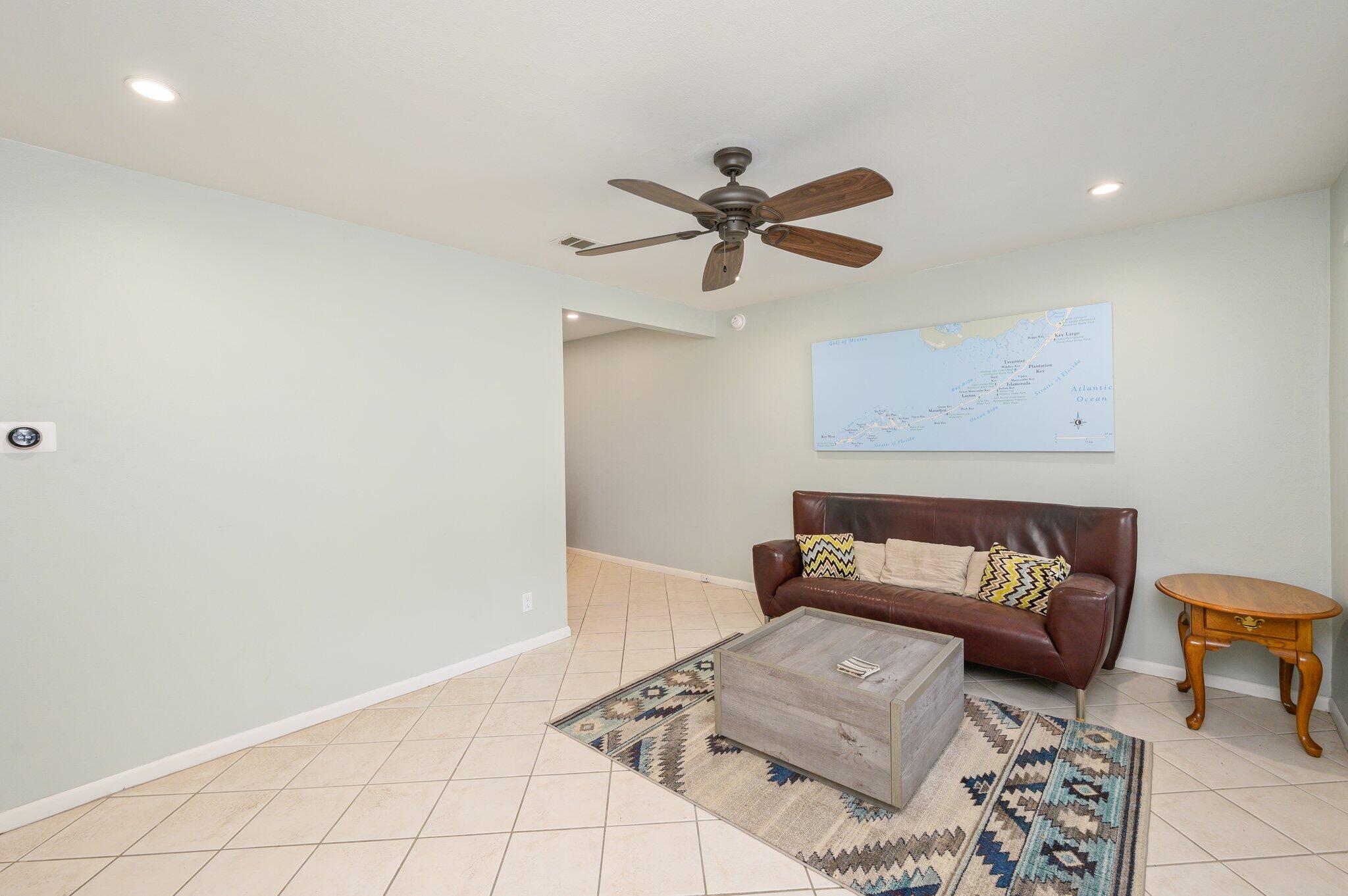 133 Smith Street Crestview, FL 32539 - Photo 5 of 28 a living room with furniture and a rug