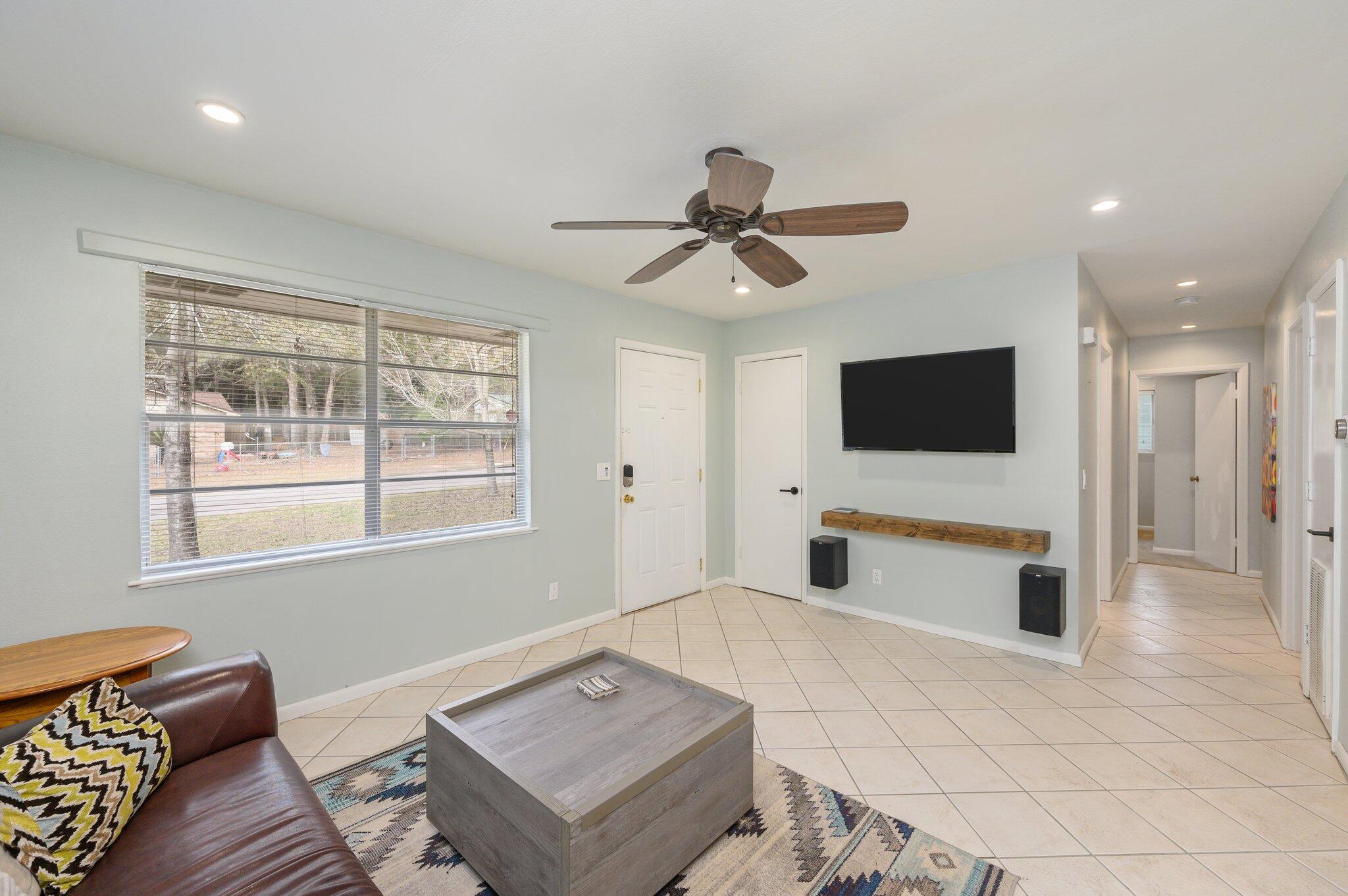 133 Smith Street Crestview, FL 32539 - Photo 7 of 28 a living room with furniture and a flat screen tv