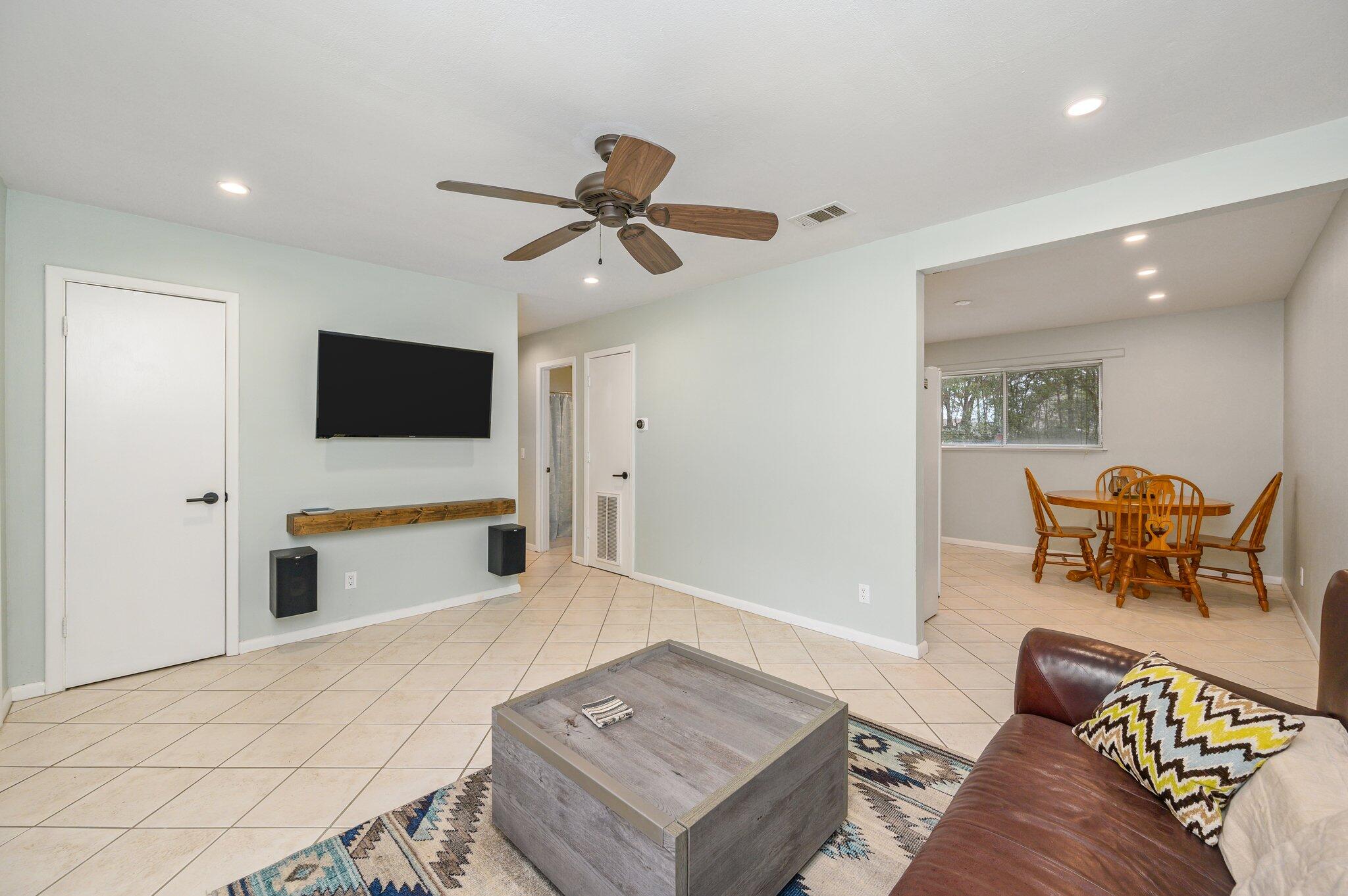 133 Smith Street Crestview, FL 32539 - Photo 8 of 28 a living room with furniture and a flat screen tv
