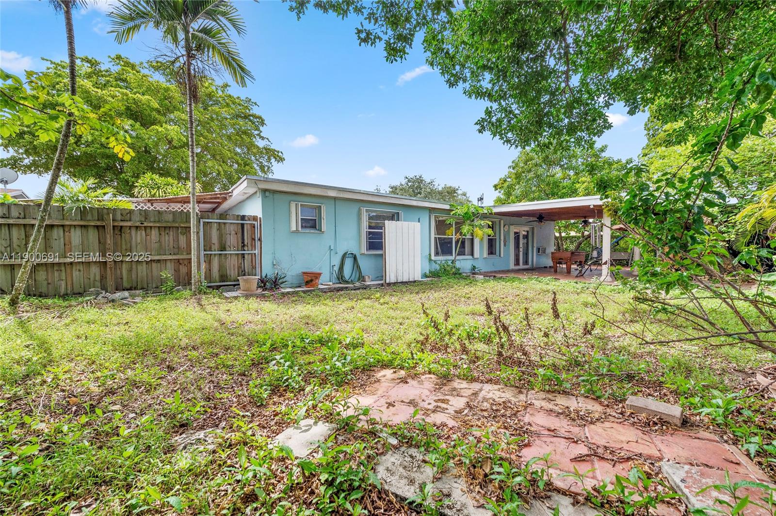 7311 Southwest 139th Avenue Miami, FL 33183 - Photo 31 of 37 a house view with a garden space