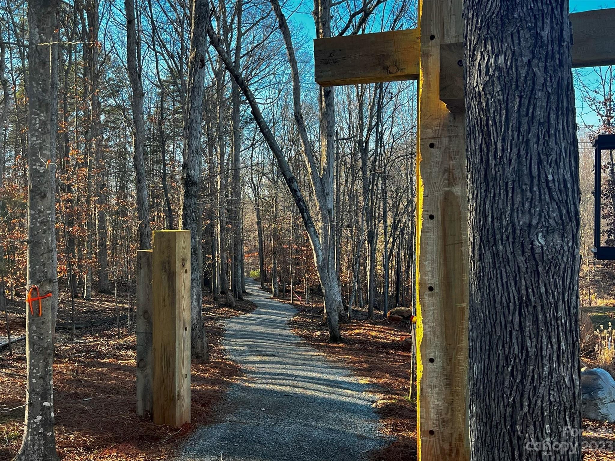 157 Copper Pne Lane, Unit 7 Davidson, NC 28036 - Photo 9 of 20 a view of a pathway of a house