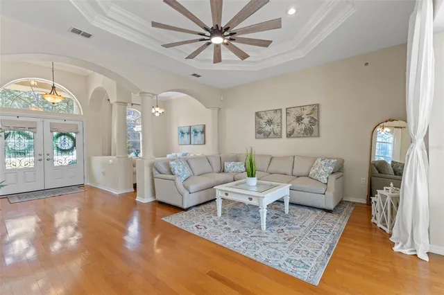 a living room with furniture and a fireplace