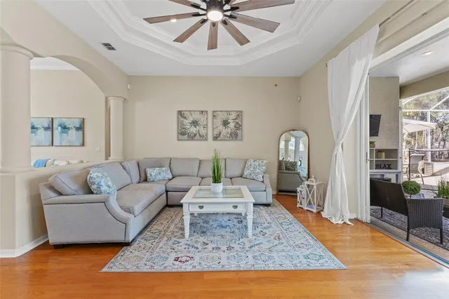 a living room with furniture and a rug