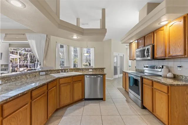 a bedroom with a bed and a fireplace