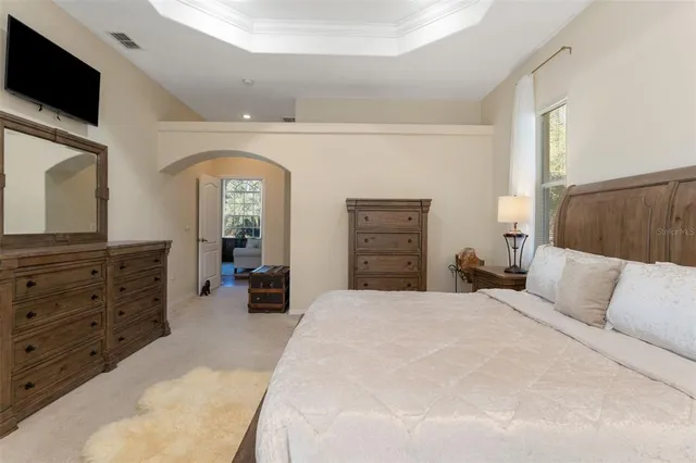 a bathroom with a shower curtain and a shower