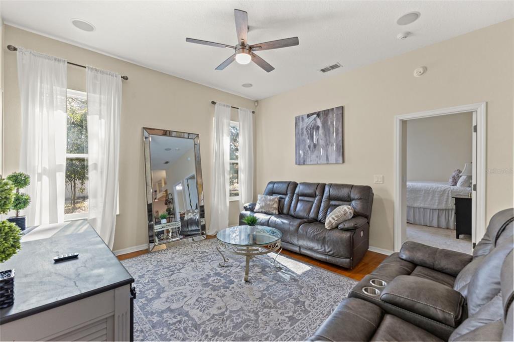 14071 Linden Drive Spring Hill, FL 34609 - Photo 37 of 77 a living room with furniture and a couch