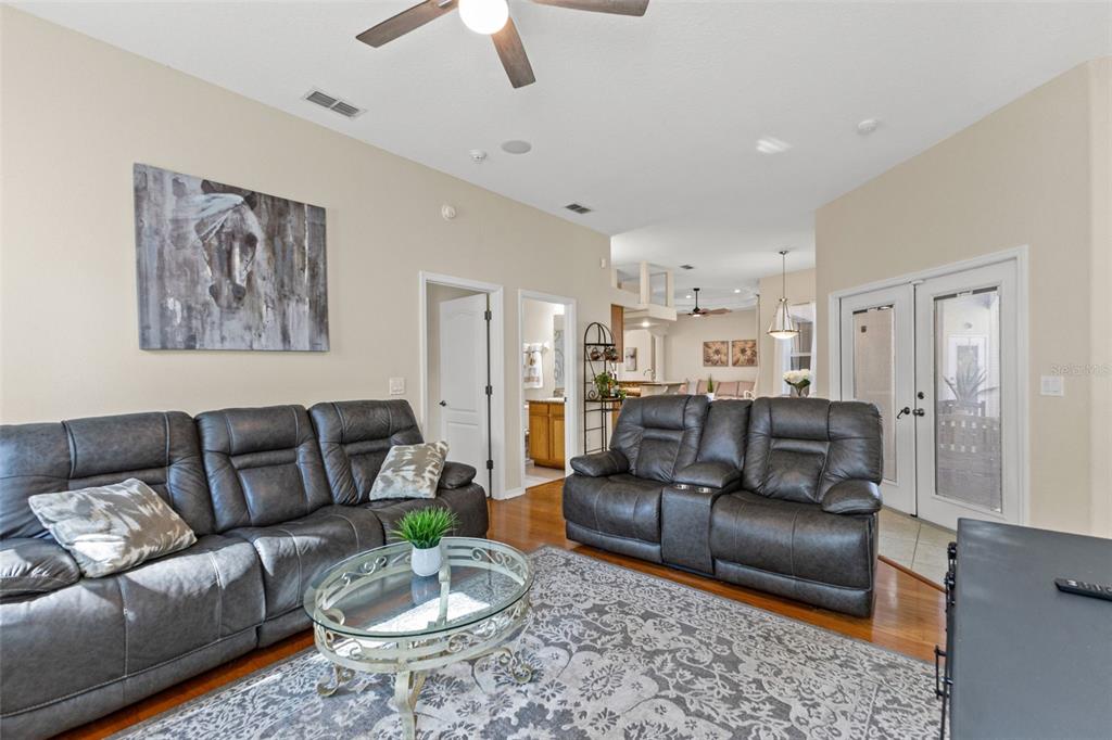 14071 Linden Drive Spring Hill, FL 34609 - Photo 38 of 77 a living room with furniture and a rug