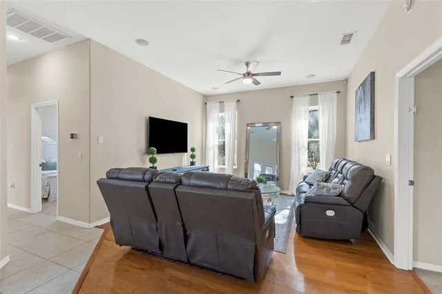 a front view of a house with a garage and yard