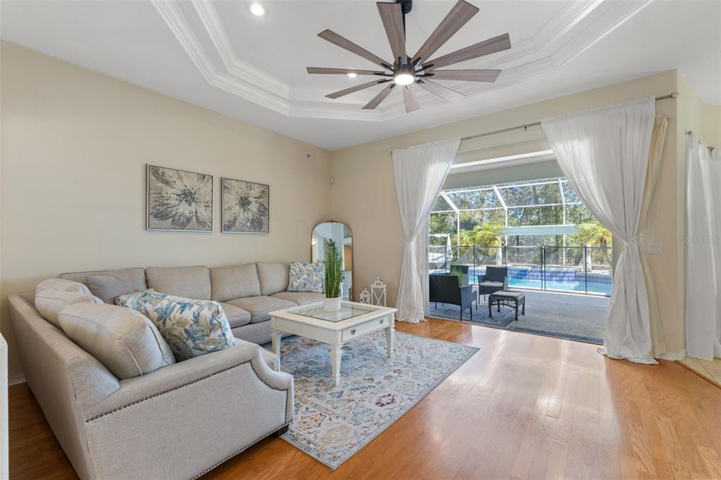 14071 Linden Drive Spring Hill, FL 34609 - Photo 10 of 77 a living room with furniture and a large window