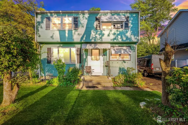 a view of a building with a yard