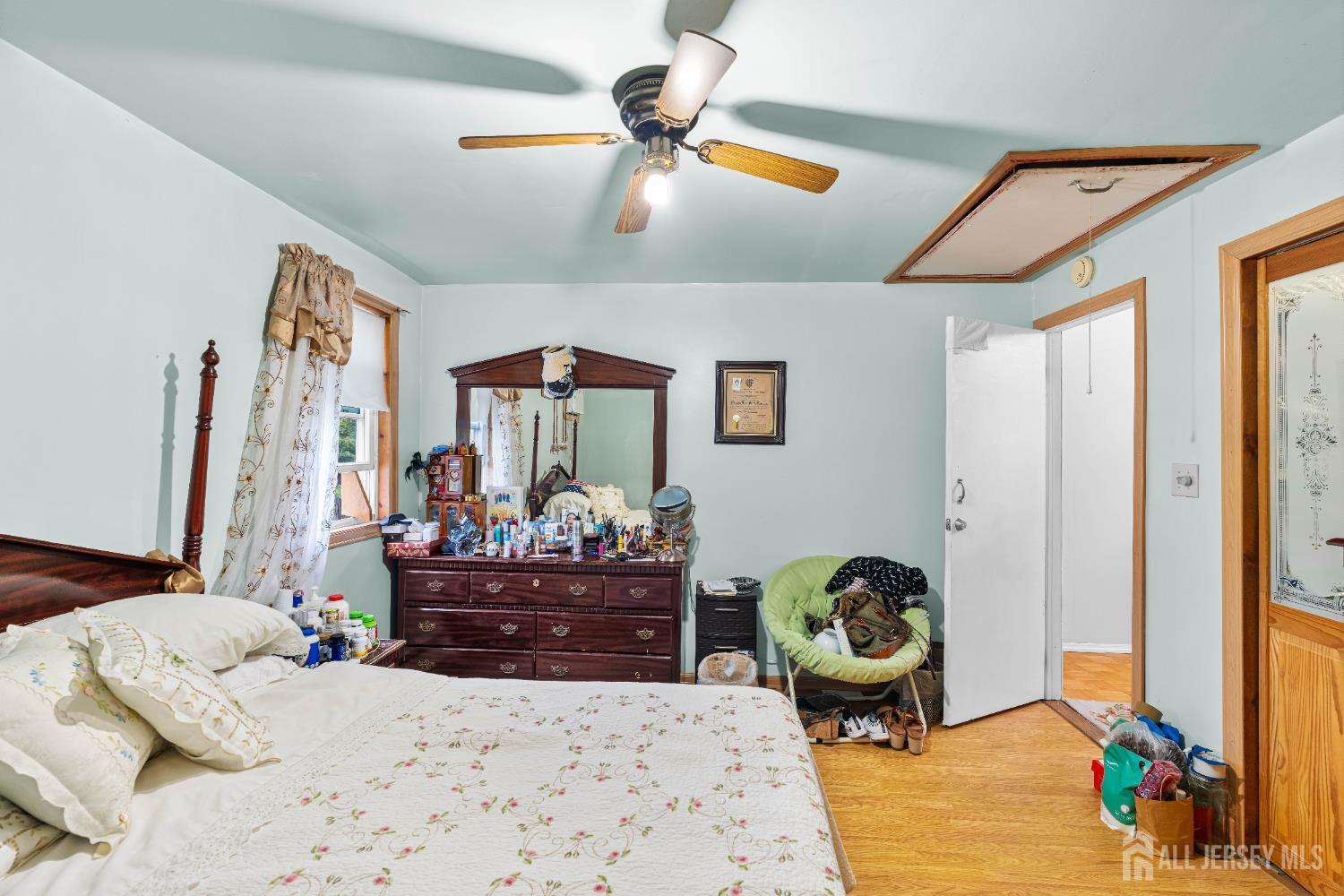 651 Fairview Avenue Piscataway, NJ 08854 - Photo 12 of 45 a bedroom with a bed and ceiling fan
