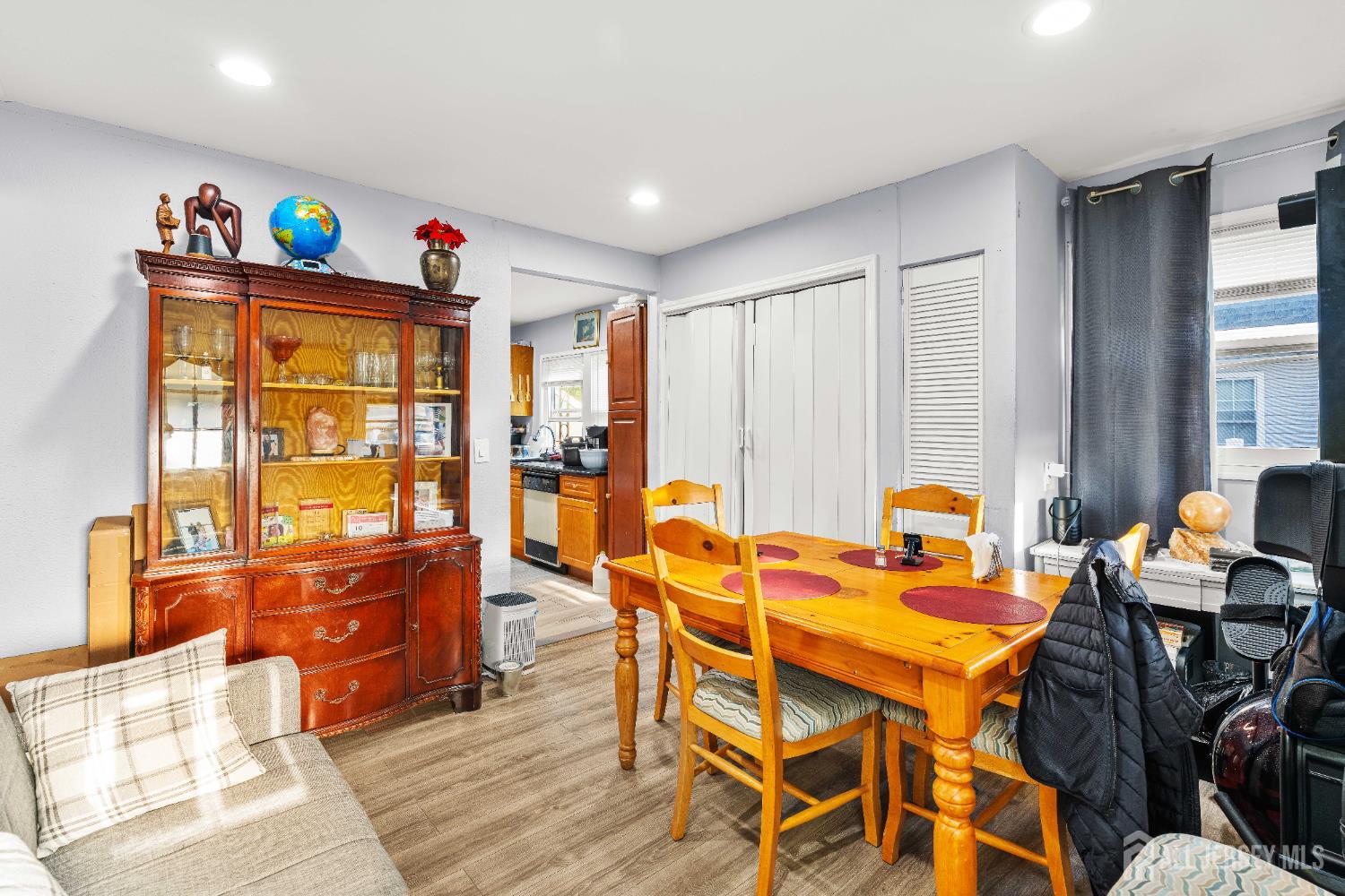 651 Fairview Avenue Piscataway, NJ 08854 - Photo 18 of 45 a view of a dining room with furniture a chandelier and wooden floor