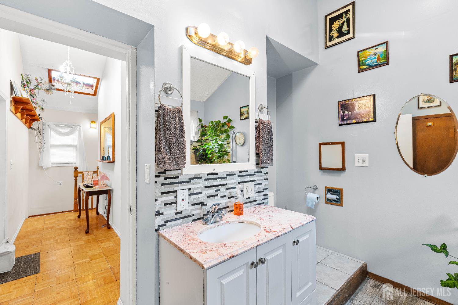 651 Fairview Avenue Piscataway, NJ 08854 - Photo 28 of 45 a bathroom with a sink vanity and a mirror