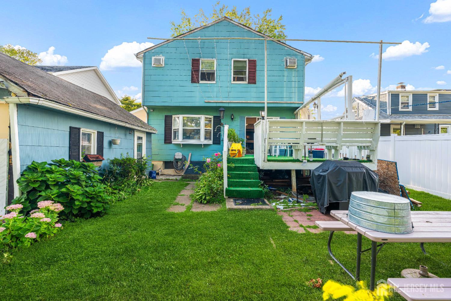 651 Fairview Avenue Piscataway, NJ 08854 - Photo 31 of 45 a front view of house with a garden and patio