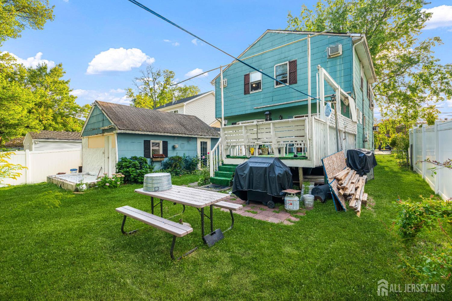 651 Fairview Avenue Piscataway, NJ 08854 - Photo 32 of 45 a view of a house with a yard porch and sitting area