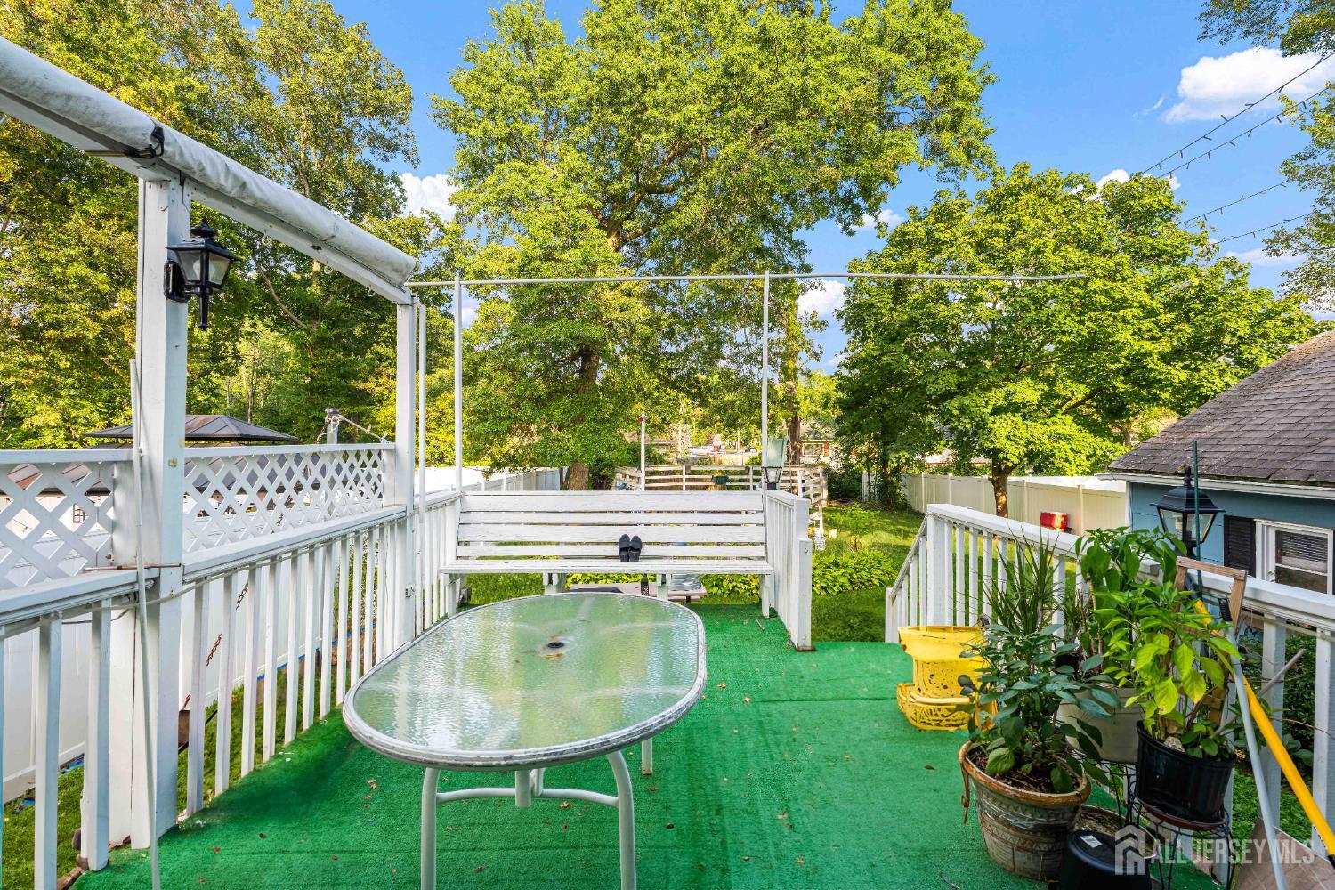 651 Fairview Avenue Piscataway, NJ 08854 - Photo 34 of 45 a view of a chair and table in backyard of the house
