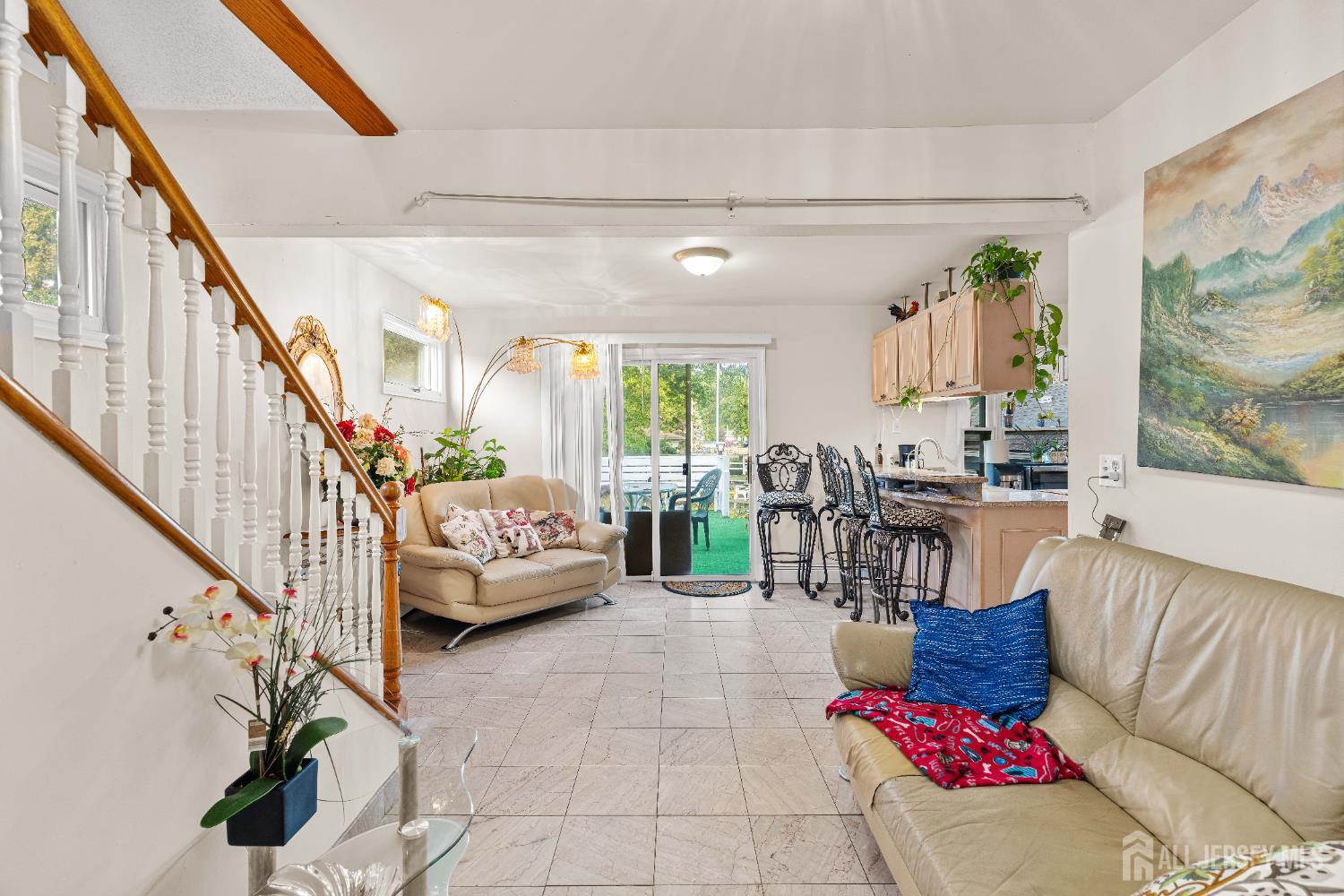 651 Fairview Avenue Piscataway, NJ 08854 - Photo 5 of 45 a living room with furniture and a painting on the wall