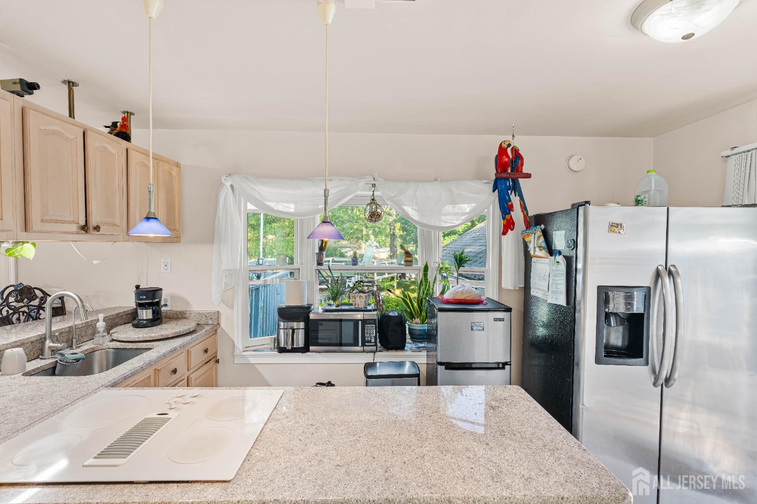 651 Fairview Avenue Piscataway, NJ 08854 - Photo 9 of 45 a kitchen with a refrigerator and a sink