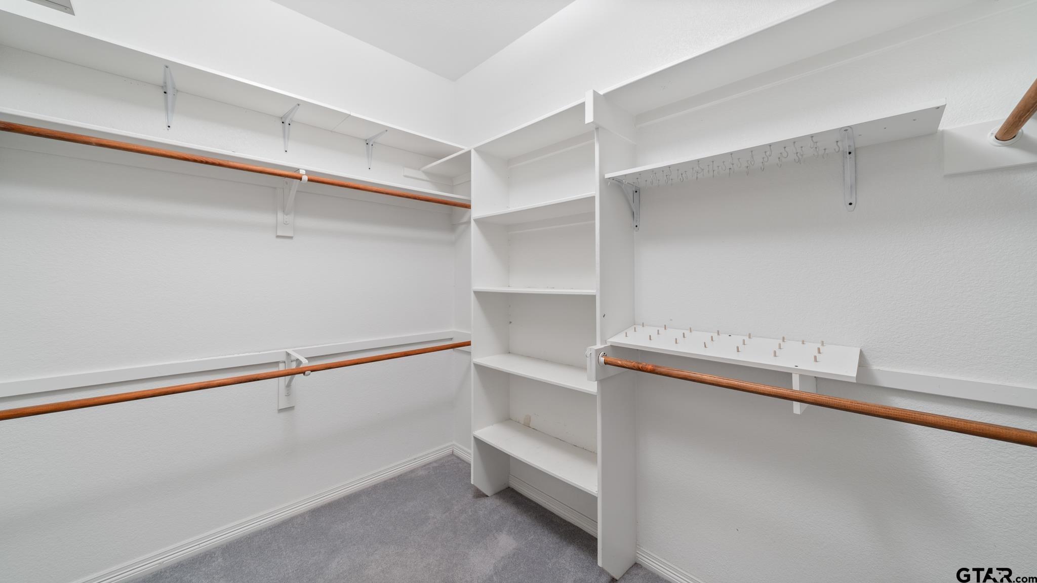 291 VZ County Road Canton, TX 75103 - Photo 23 of 42 a view of an empty walk in closet