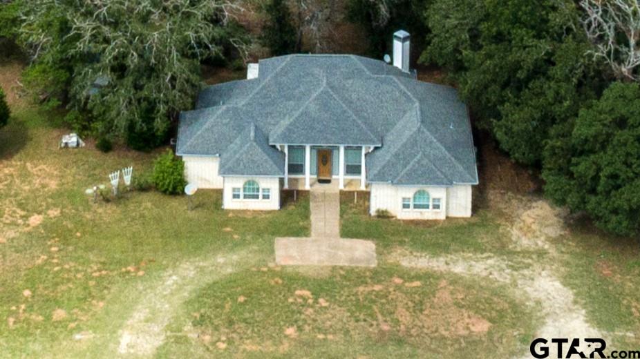 291 VZ County Road Canton, TX 75103 - Photo 34 of 42 a front view of a house with garden