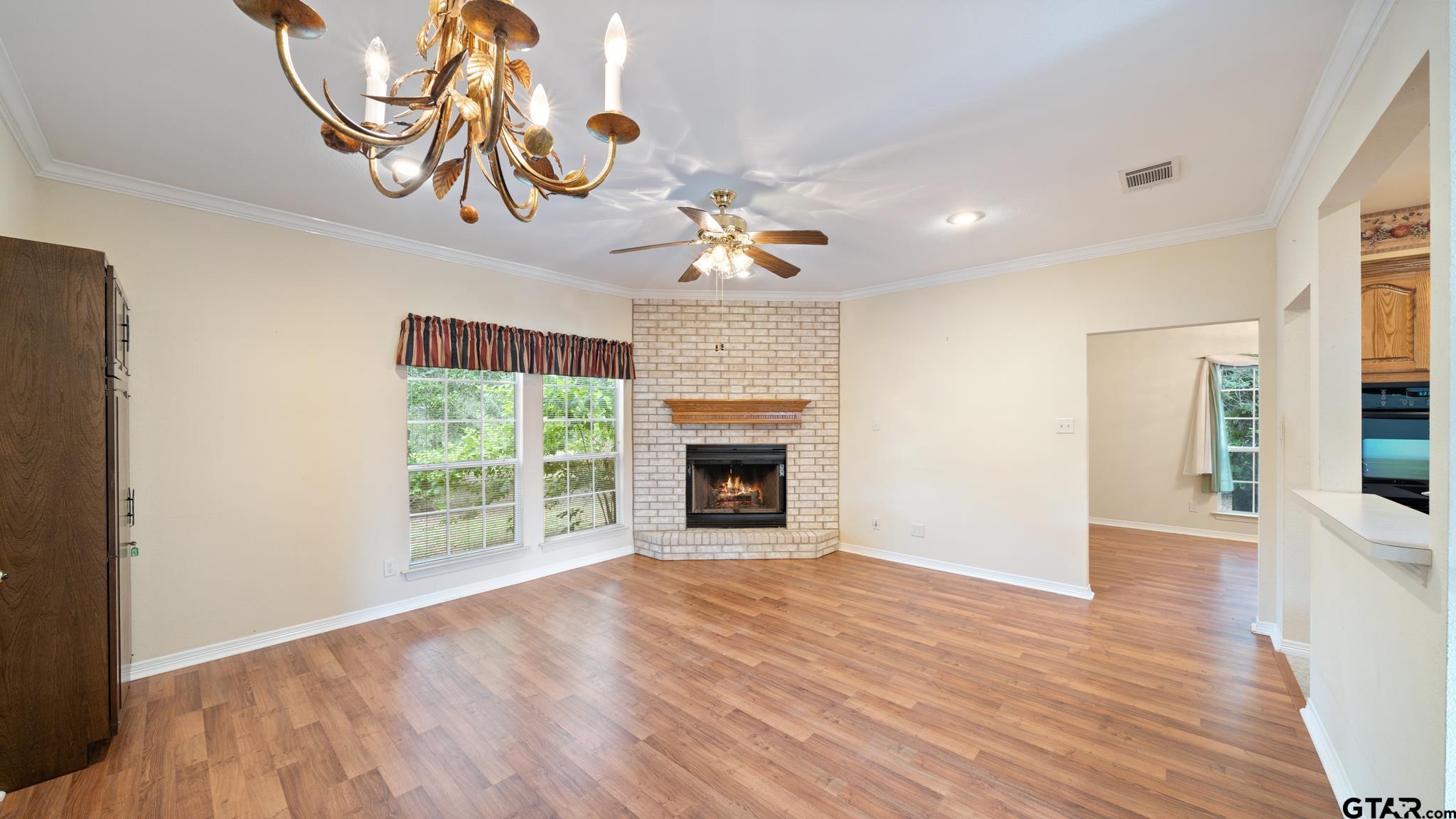 291 VZ County Road Canton, TX 75103 - Photo 9 of 42 a view of a livingroom with a fireplace and window