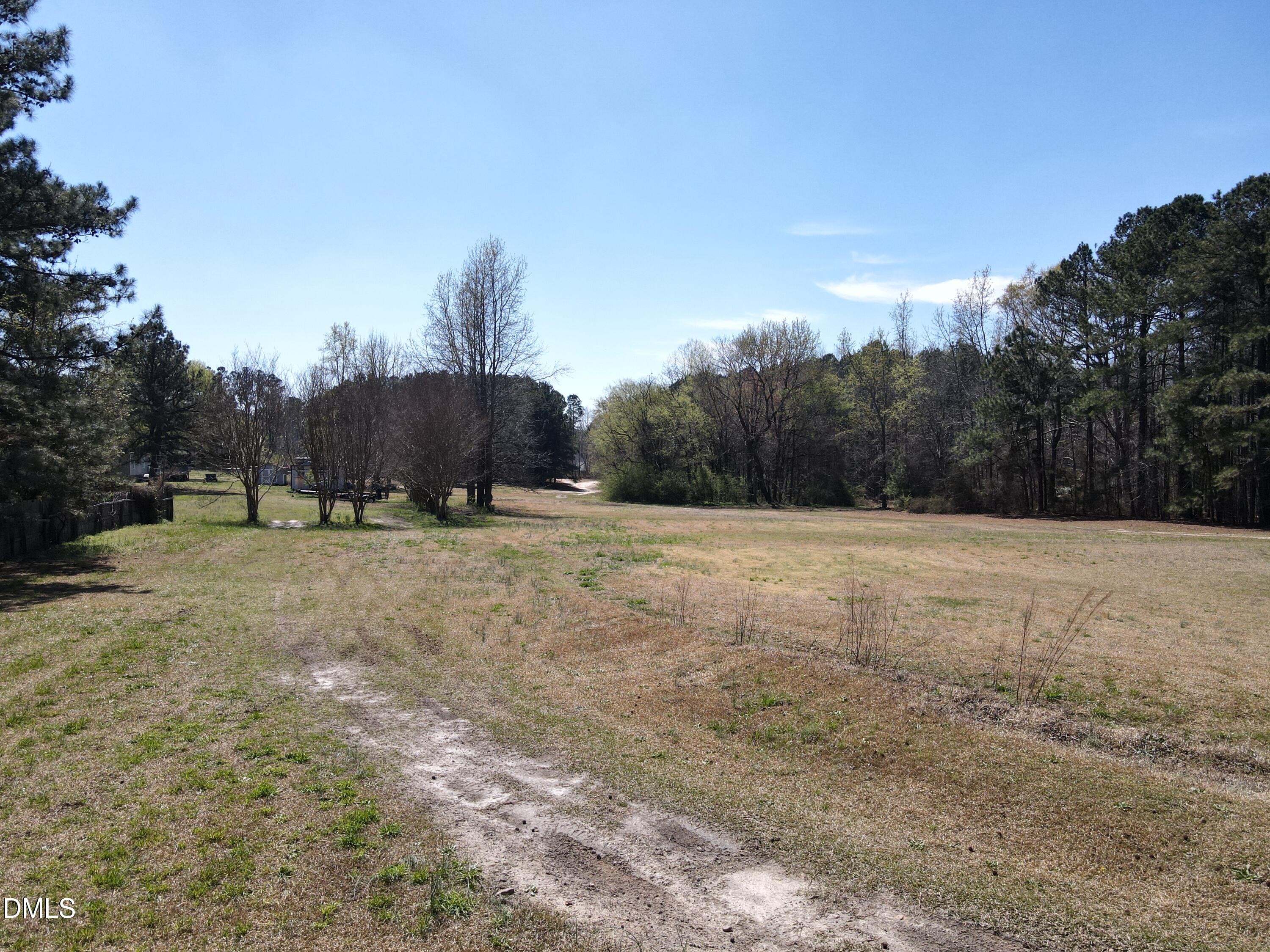 405 Old Eason Road Zebulon, NC 27597 - Photo 8 of 13 a view of a field