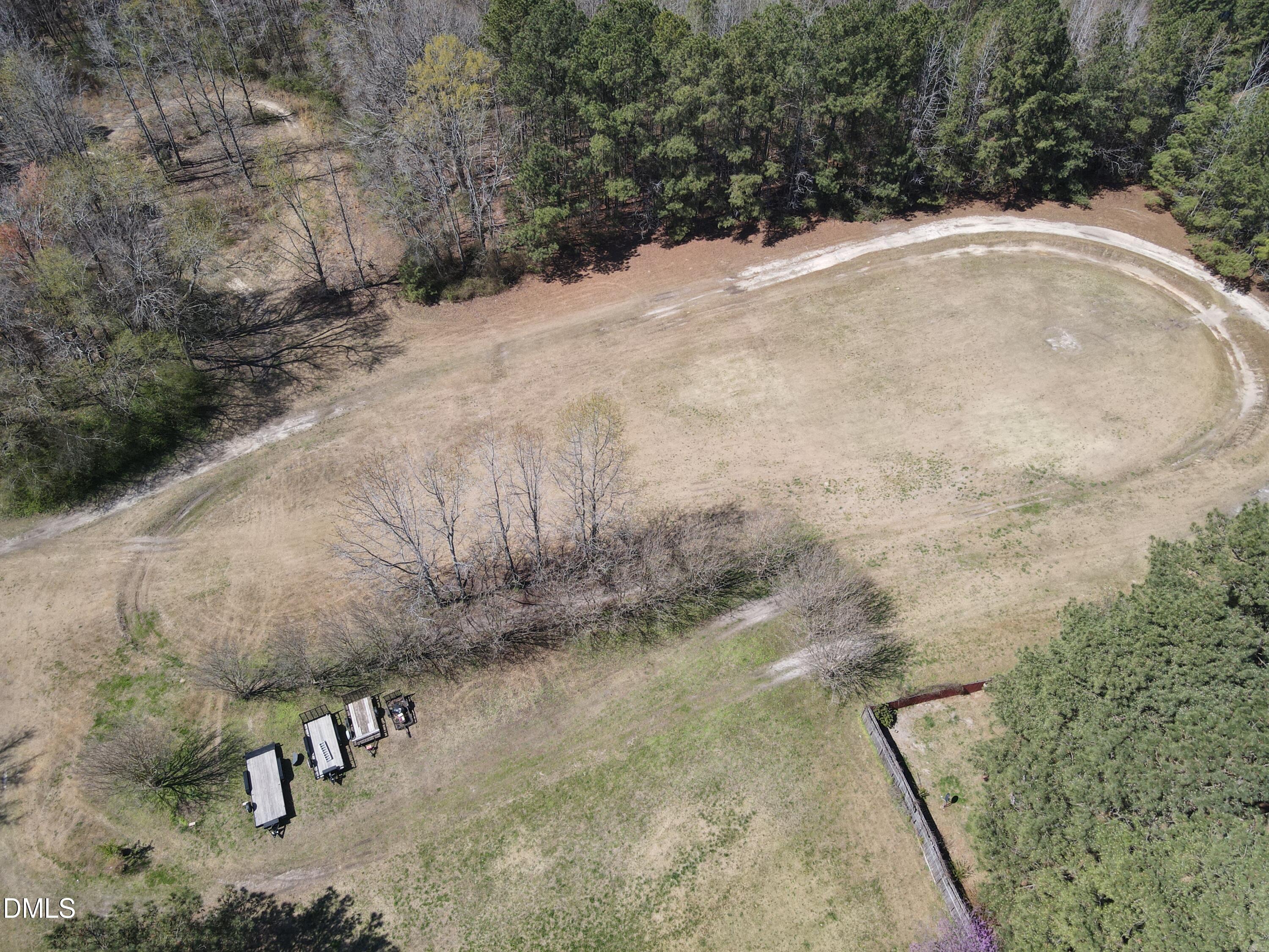 405 Old Eason Road Zebulon, NC 27597 - Photo 9 of 13 a view of outdoor space and yard
