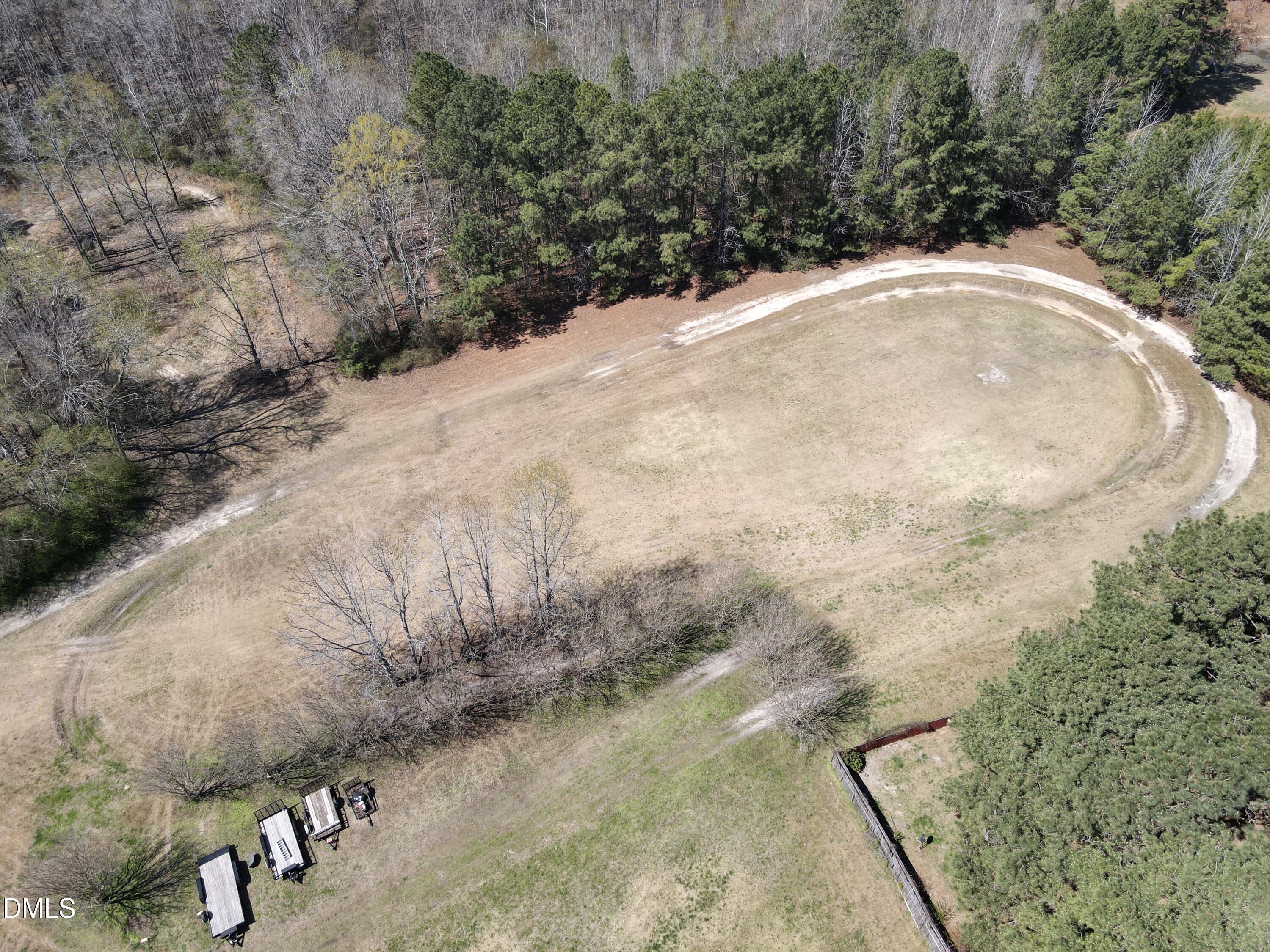 405 Old Eason Road Zebulon, NC 27597 - Photo 10 of 13 a view of outdoor space and yard