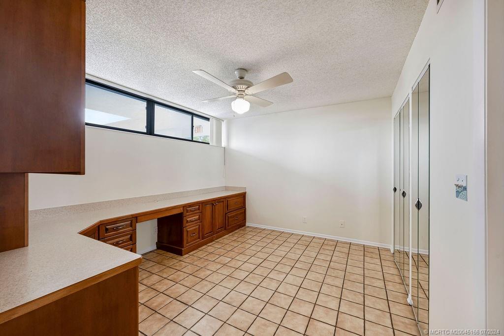 1950 Southwest Palm City Road, Unit 14302 Stuart, FL 34994 - Photo 21 of 62 a view of an empty room and window