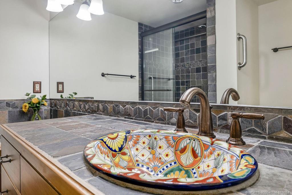 1950 Southwest Palm City Road, Unit 14302 Stuart, FL 34994 - Photo 25 of 62 a view of a sink dining room with wooden floor